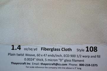 1.4 oz/sq yd style 108 fiberglass cloth close up with data from Thayercraft