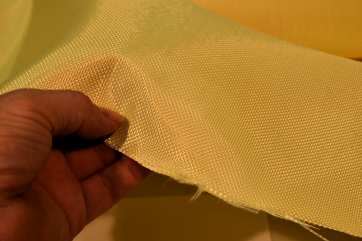 Style 1129 4.3 oz Kevlar from Thayercraft style 1129 Kevlar in Steve Thayer's hand