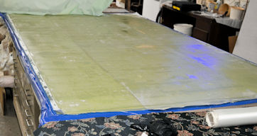 14609 and 1543 wet out 14609 Kevlar/glass with 1543 in epoxy on glass sheet