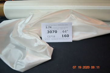 3070 44 CS718 160yd roll loose on table with factory core showing 2.74 osy style 70x70 balanced fiberglass cloth