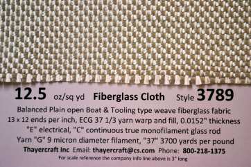 3789 12.5 oz/sq yd Fiberglass cloth close up with construction data from Thayercraft 3789 12.5 oz/sq yd Fiberglass cloth close up with construction data from Thayercraft