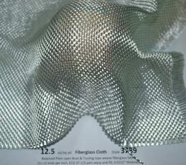 3789 12.5 oz/sq yd Fiberglass cloth shaped around baseball from Thayercraft