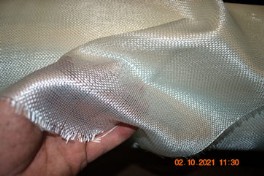 4796 3.63 osy Fiberglass Cloth Hand holding close up