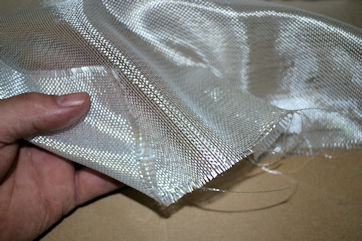 4.7 osy COMBO 5 oz FIBERGLASS CLOTH close up in hand