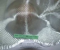Style 7725 8.5 oz/sq yd 2x2 twill fiberglass cloth shaped over baseball Style 7725 8.5 oz/sq yd 2x2 twill fiberglass cloth shaped over baseball
