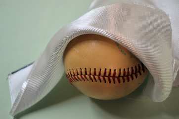 8.95 oz Style 7781 Volan finish fiberglass cloth from Thayercraft 7781 504 Volan folded back on baseball