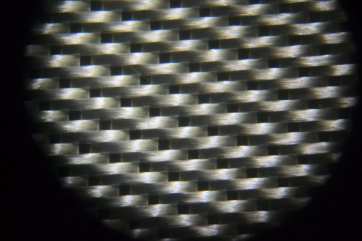 Micro view 8 Harness Satin Weave Style 7781 Fiberglass Cloth Thayercraft 8 Harness Satin Weave 7781 microscope photo thayercraft