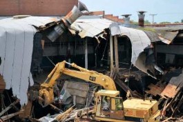 Steve Thayer doing demolition old Alma Desk finish line bldg Steve Thayer doing demolition old Alma Desk finish line bldg