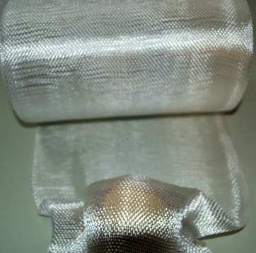 7.5 oz/sq yd Fiberglass Tape style T75 from Thayercraft T75 Fiberglass Tape shaped over baseball from Thayercraft